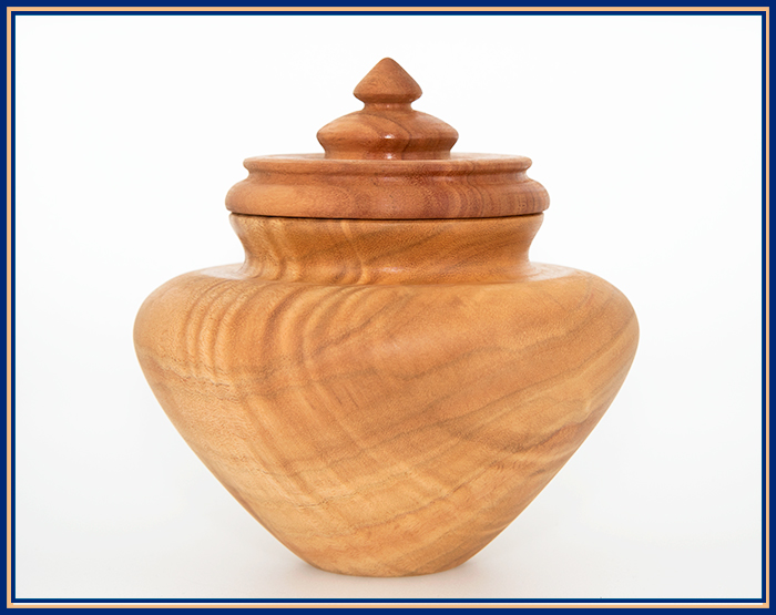 A turned camphor vase with a eucalyptus lid by artisan Jeni Benos