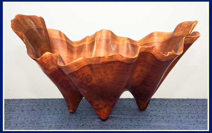wavy wooden bowl with three legs by Bruce Fransen