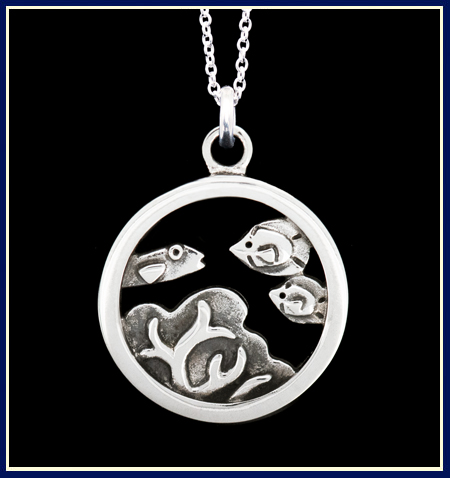 Sterling silver necklace with fish and coral in a circle