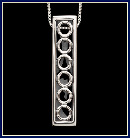 Rectangular pendant with circles by Jeni Benos