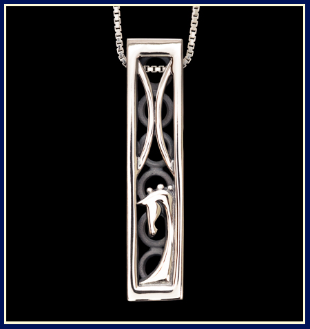 a rectangular necklace with a horse and two half loops from dressage