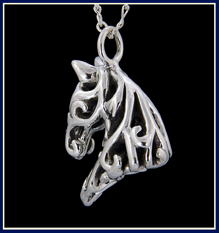 view from back of floral filigree horse pendant 