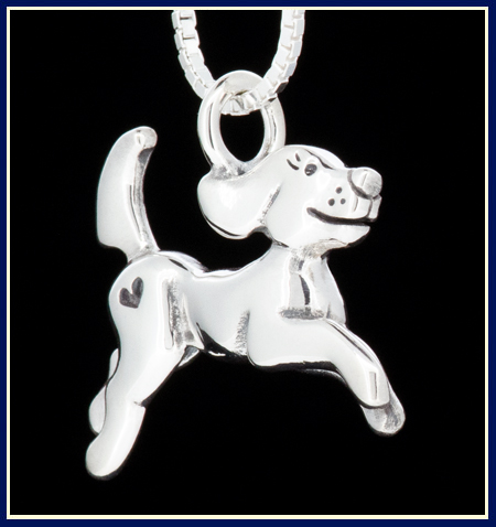 Dog pendant with heart in sterling silver handmade by Jeni Benos