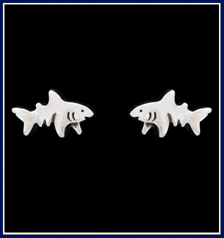 A pair of sterling silver shark stud earrings by Jeni Benos